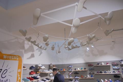 A shoe mobile is a standout feature of the store design